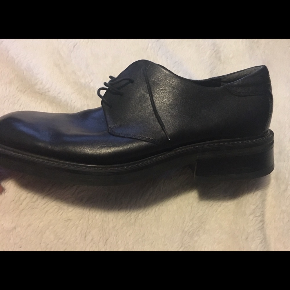 Unlisted dress shoes